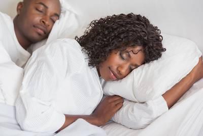 Couple sleeping soundly with Night Guards