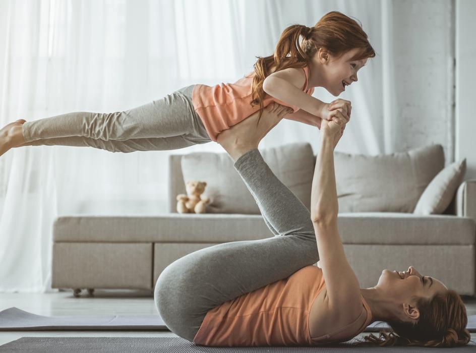 woman with daughter playing on floor | dentist west chester