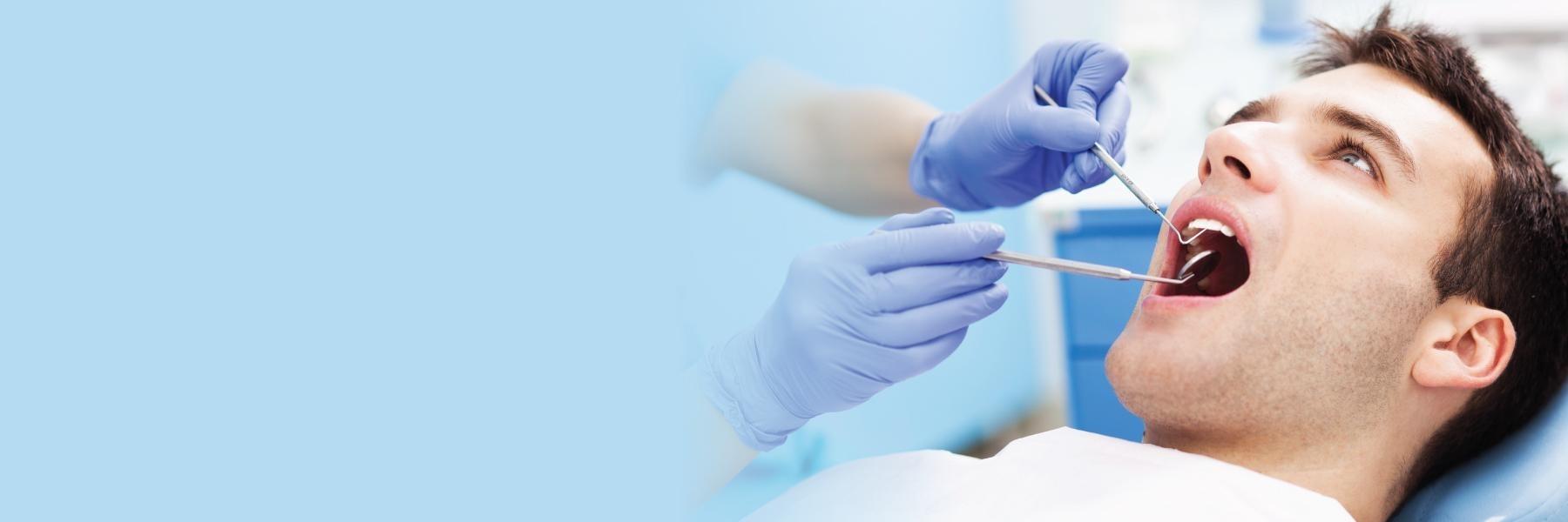man during dental bonding exam in west chester oh 