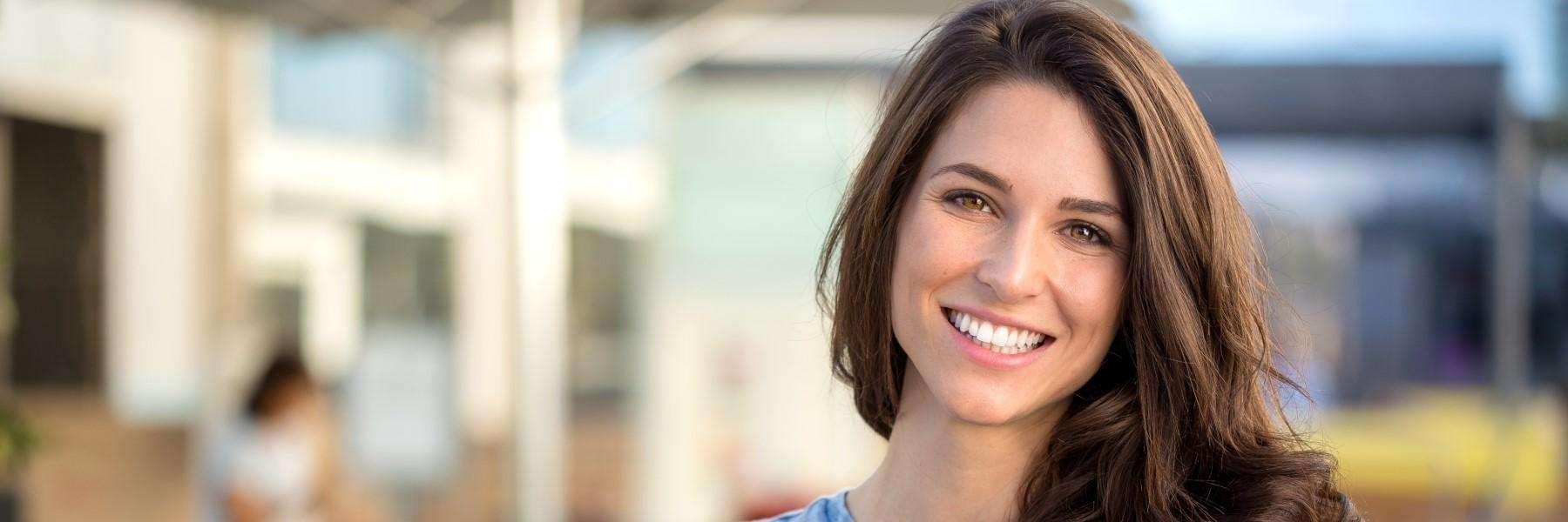 girl after dental implant restoration in west chester oh